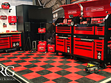 Craftman trade show booth using red and black garage floor tiles from Swisstrax